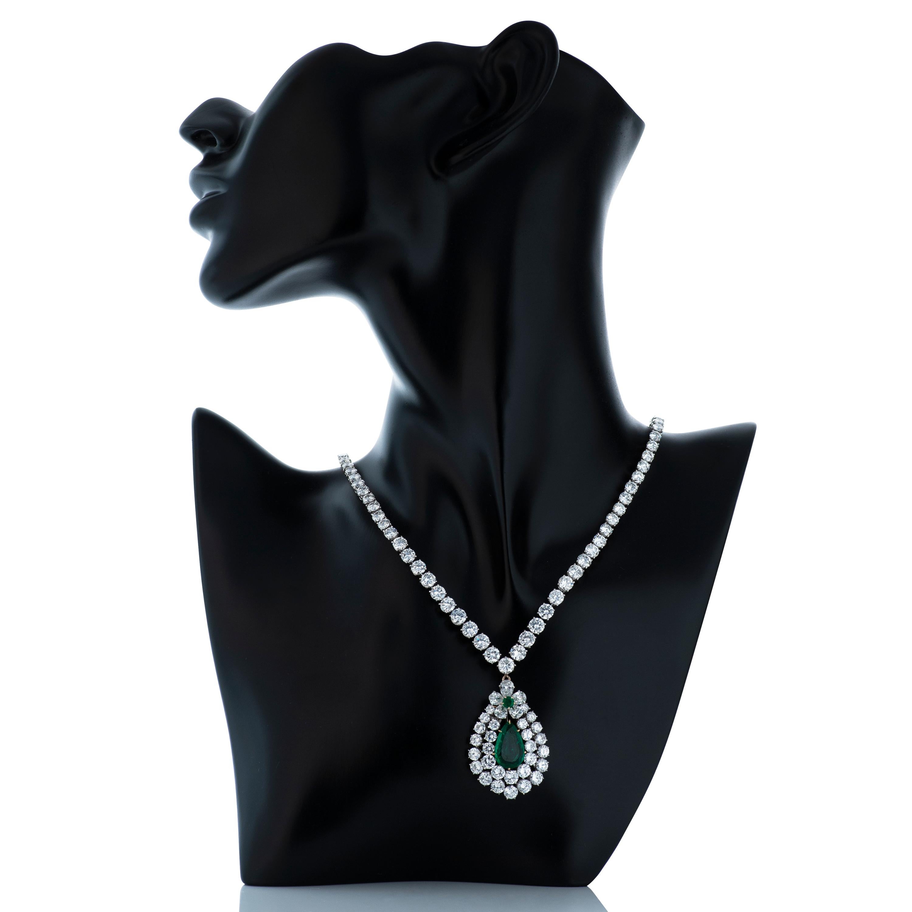 Van Cleef & Arpels platinum Colombian emerald and diamond necklace with French hallmarks.

The centerpiece of this necklace is a 3.83 carat pear shape Colombian emerald accompanied by an AGL report, accented by a 0.30 carat round emerald set above