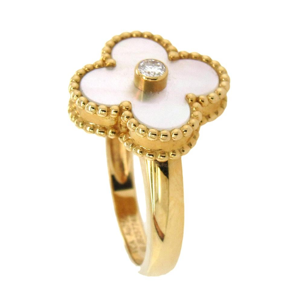 VCA 18K yellow gold and mother-of-pearl ‘Alhambra’ ring with its iconic quatrefoil design, beaded edging and mother-of-pearl inlay. The ring measures 5/8″ diameter, from a private estate, accompanied by original box. Size 4.75.