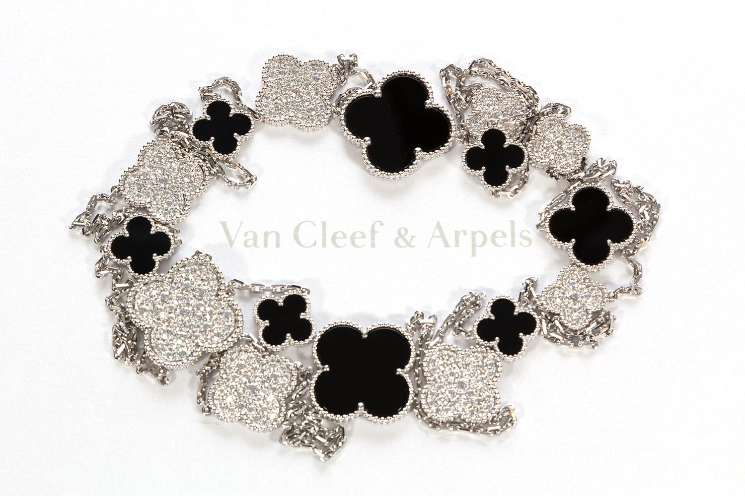 We are pleased to offer this beautiful Guaranteed Authentic Van Cleef & Arpels Fifth Avenue Edition Magic Alhambra 16 Motif Necklace with original VCA inner & outer boxes, insurance valuation and receipt. Created in 2006 by Van Cleef & Arpels, the