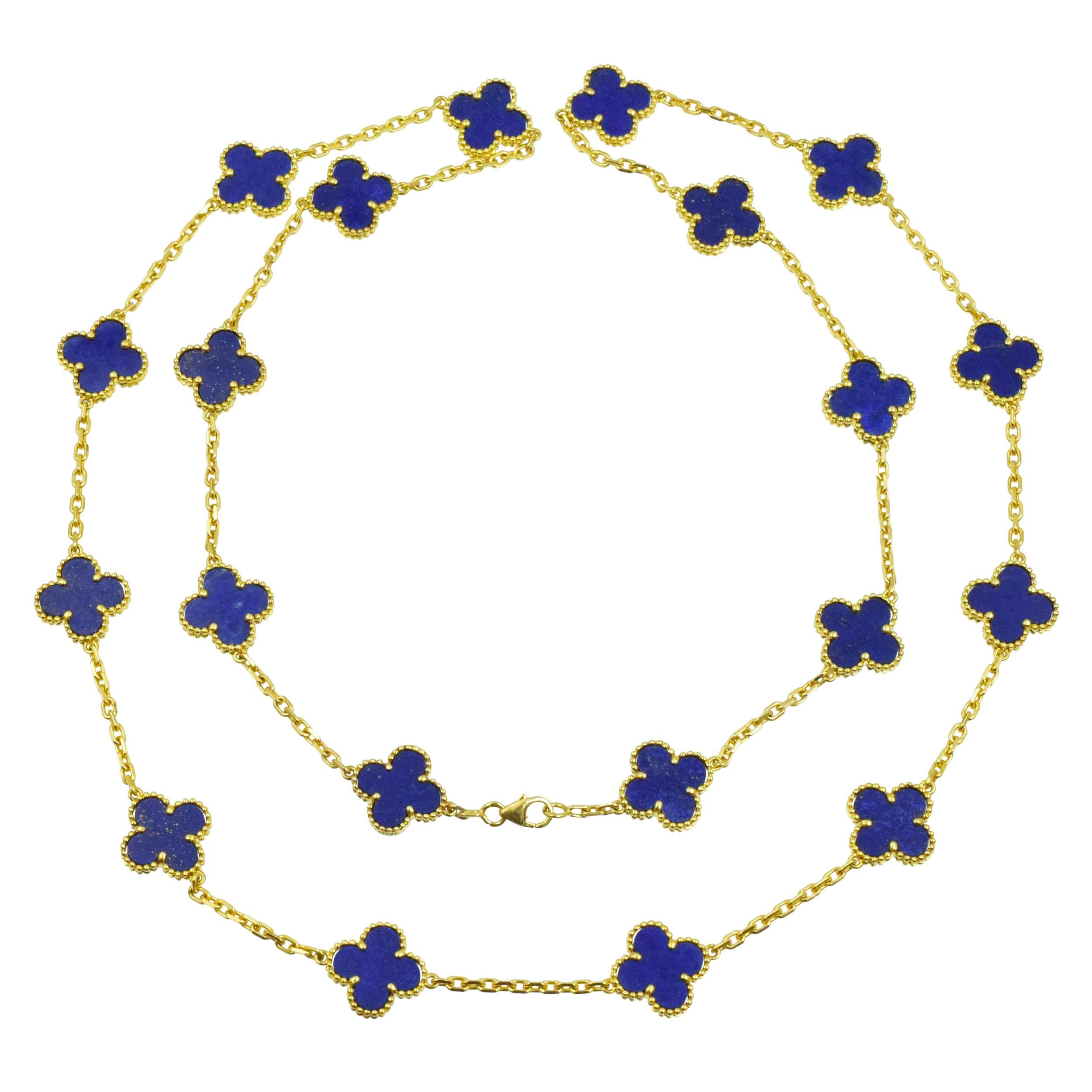 VCA Lapis Lazuli Vintage Alhambra Necklace in 18k
yellow gold. The necklace features 20 lapis lazuli clover motifs. Equipped with lobster clasp. Inscribed: VCA 750, 4K629.132. 
Stamped with french hallmarks and makers marks.
 Motif measurements: