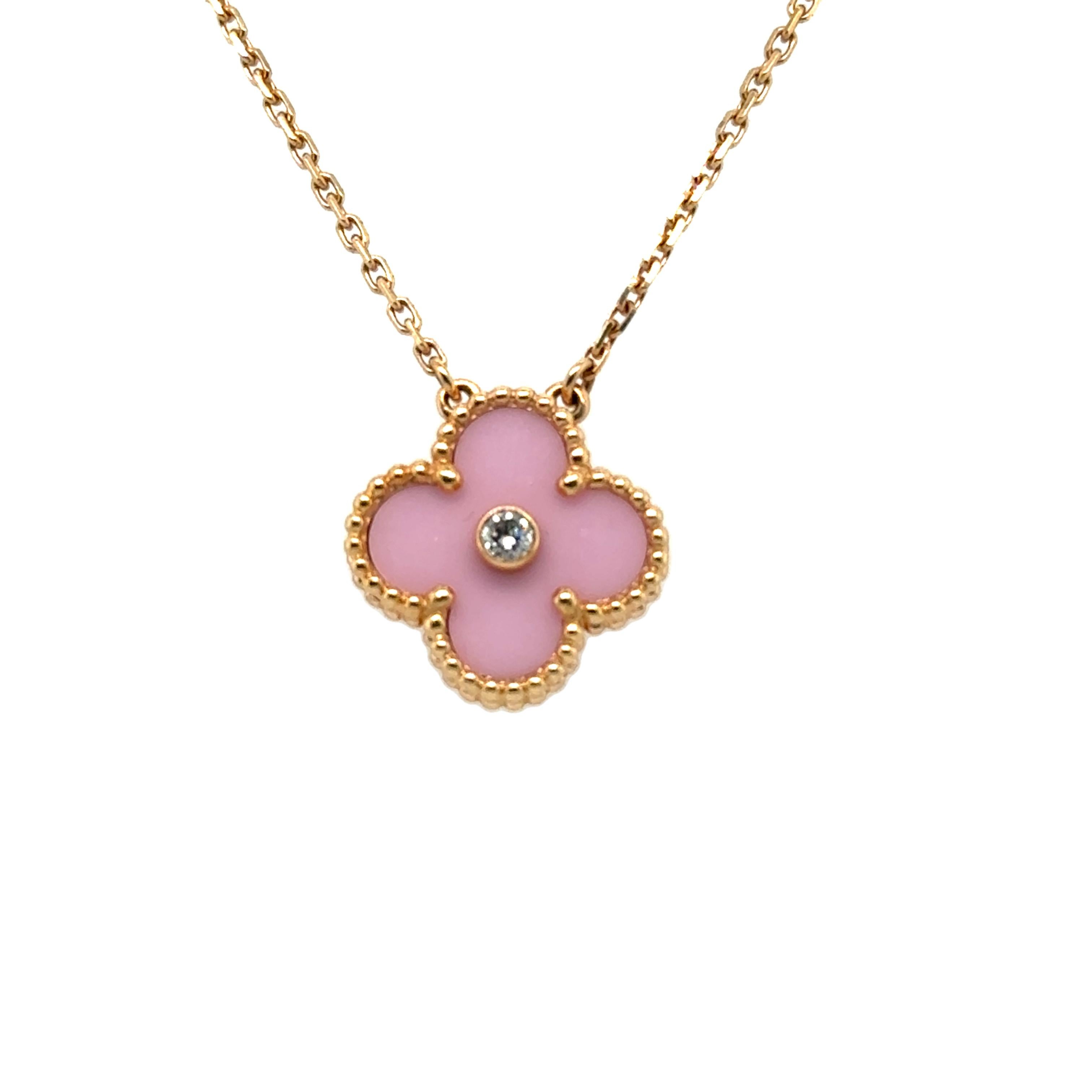 The VCA Blue Porcelaine & Diamond 2019 Limited Edition Holiday Alhambra Pendant is a stunning blend of classic charm and modern luxury. It mixes the iconic Alhambra style from Van Cleef & Arpels with the delicate beauty of Pink porcelain and a