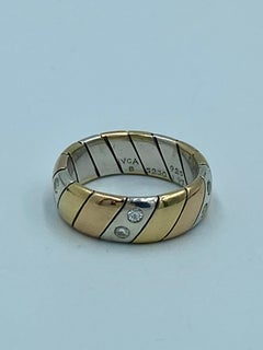VCA silver, yellow and rose gold engagement ring with diamonds