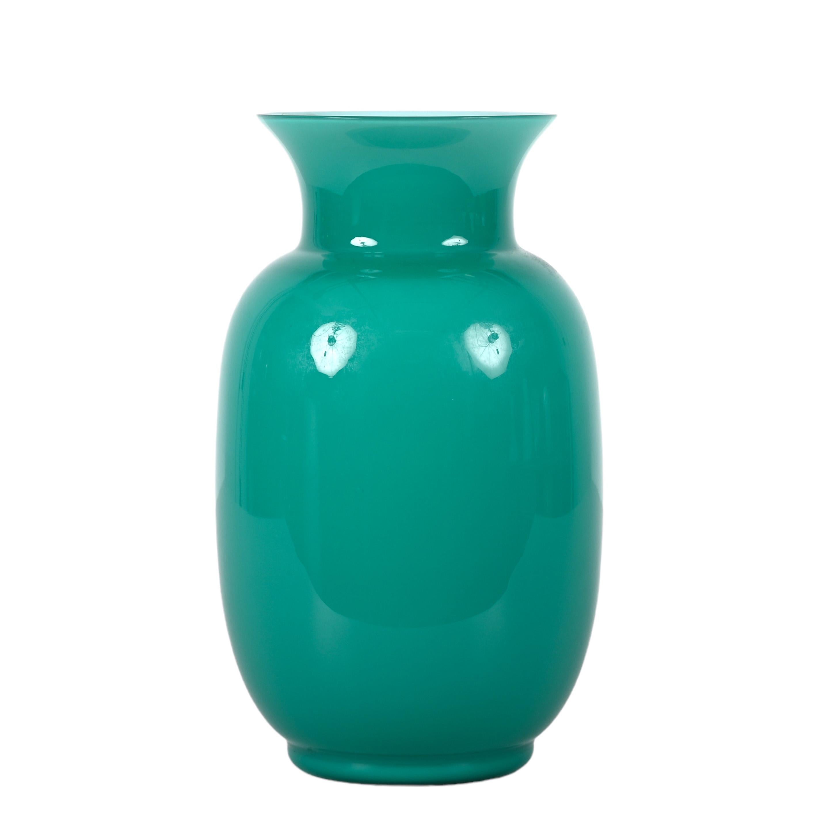 Amazing midcentury turquoise blue Murano glass vase. VeArt, the acronym for Venini Arte, produced this astonishing piece in Italy for Venini during the 1970s.

The mix of delicate white in the internal part, combined with a marvellous turquoise on