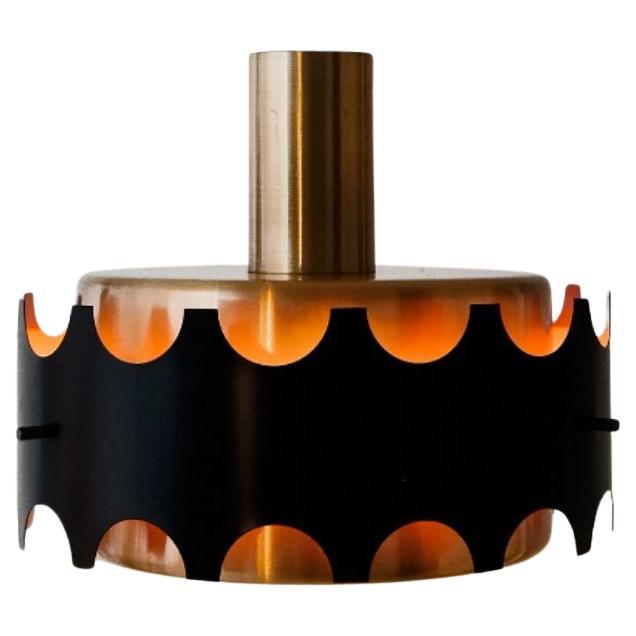 Black and silver Metal ceiling lamp made in the 1960s and 70s. 
This type is also exhibited in GRASSI Museum for Applied Arts in Leipzig. It has surface scratches due to its age, which can be seen up close.
Copper, white inside, one burner.
Several