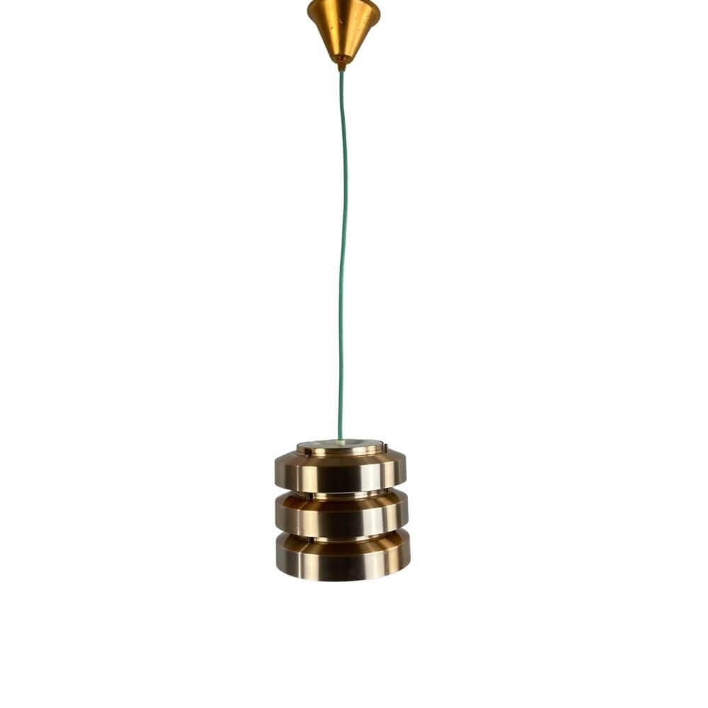 Metal ceiling lamp made in the 1960s and 70s with a turquoise 2-meter textile cord, which can be customized according to your needs.
3 lamps were exhibited together and all get turquoise textile cables for the sake of the overall effect. The