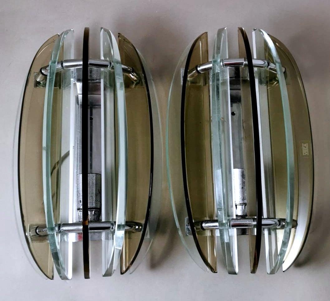 Italiano Veca per Fontana Arte Coppia di appliques italiane in acciaio e 7 cristalli