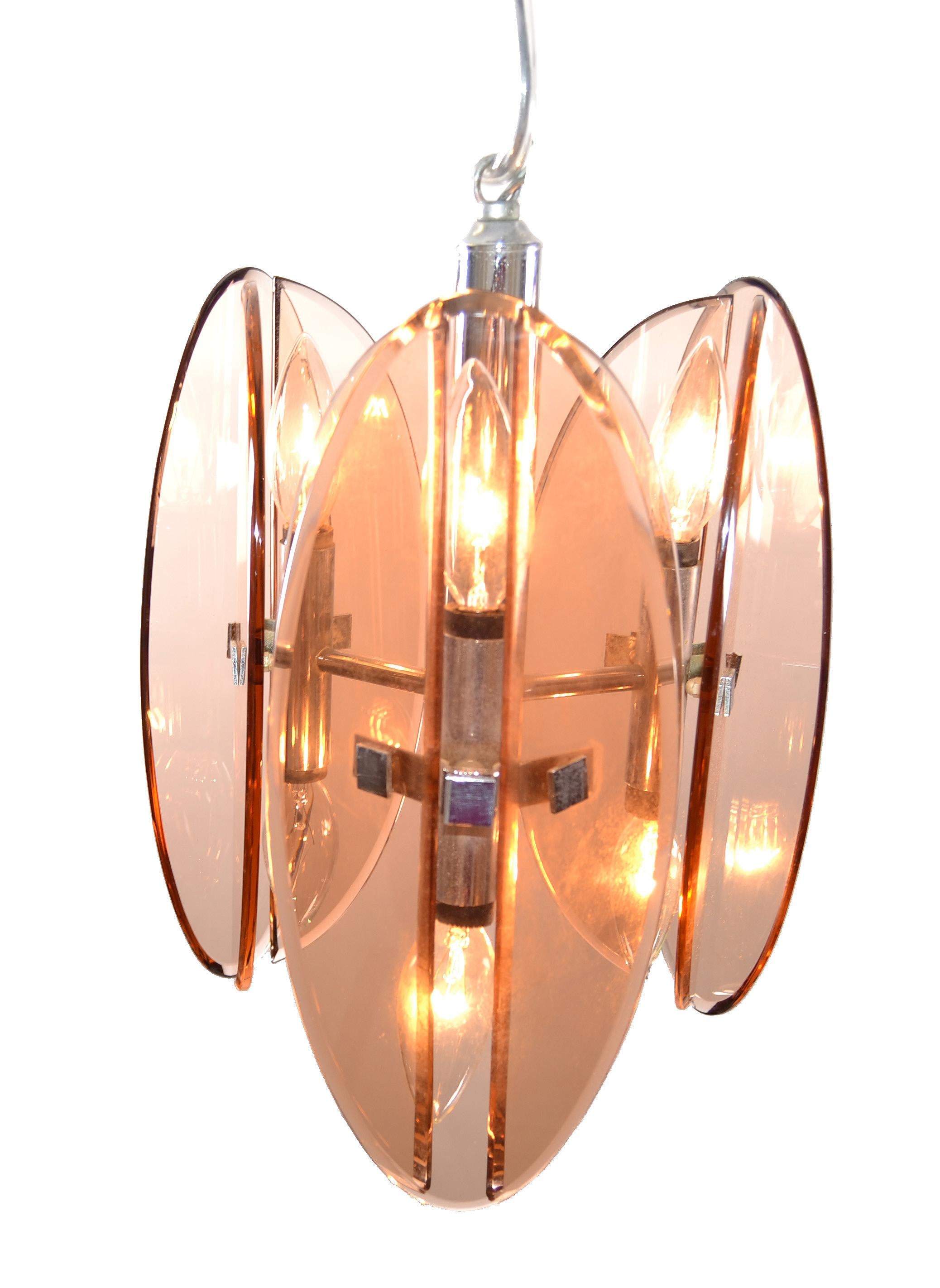 Original Mid-Century Modern 6-light chandelier by Veca made in Italy, 1970s.
Features rare pink glass panels in different shapes and mounted on a chrome frame.
US rewired and in working condition. 
Takes six candelabra light bulbs with max. 25