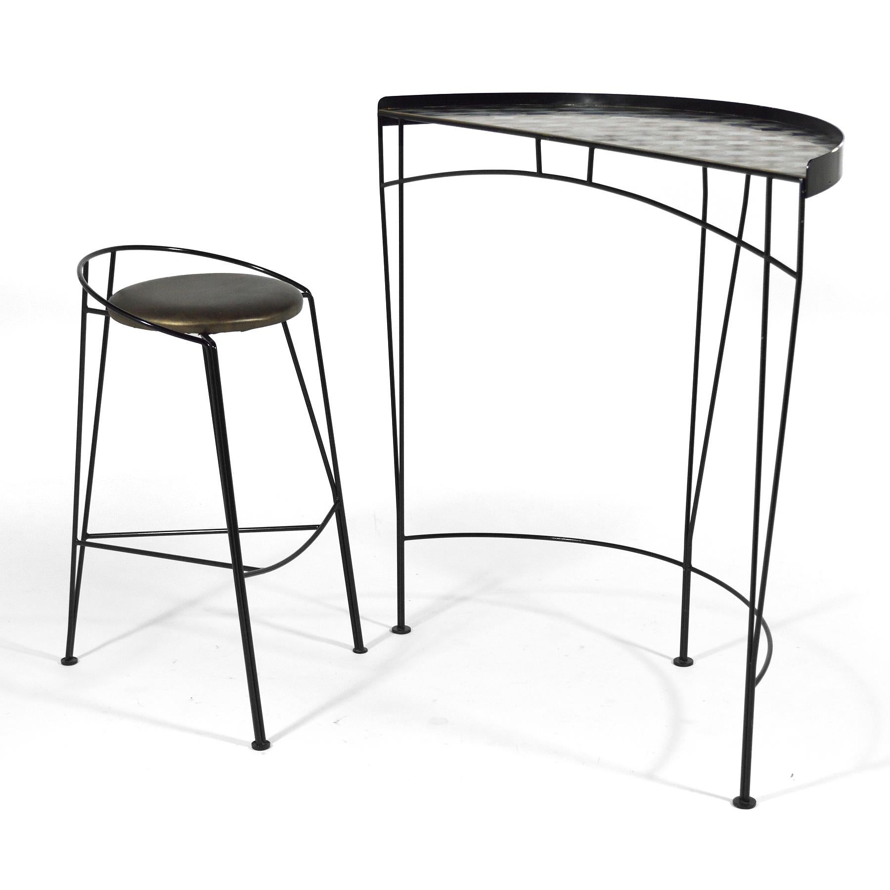 This terrific post-modern design by Vecta uses wire rod for a strong graphic quality. It features a semi-circular table with a machined steel top paired with a three-legged stool. It serves beautifully as a small desk, perfect for someone working on