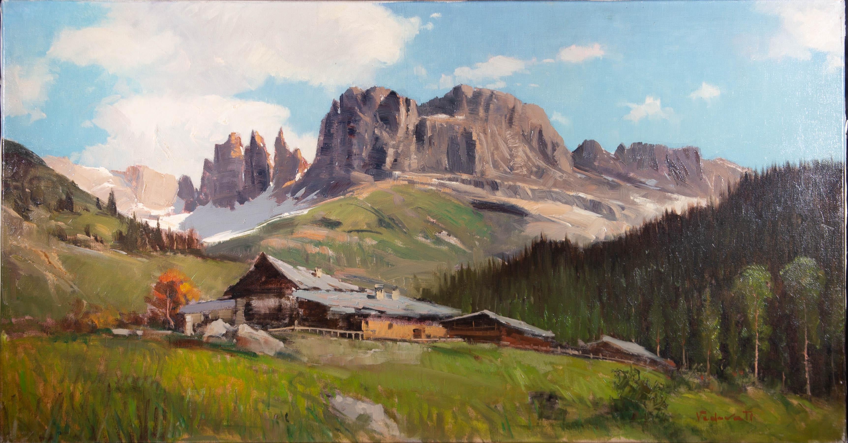 A view of a chalet at the foot of an impressive mountain range. Signed to the lower-right edge. On canvas on stretchers.
