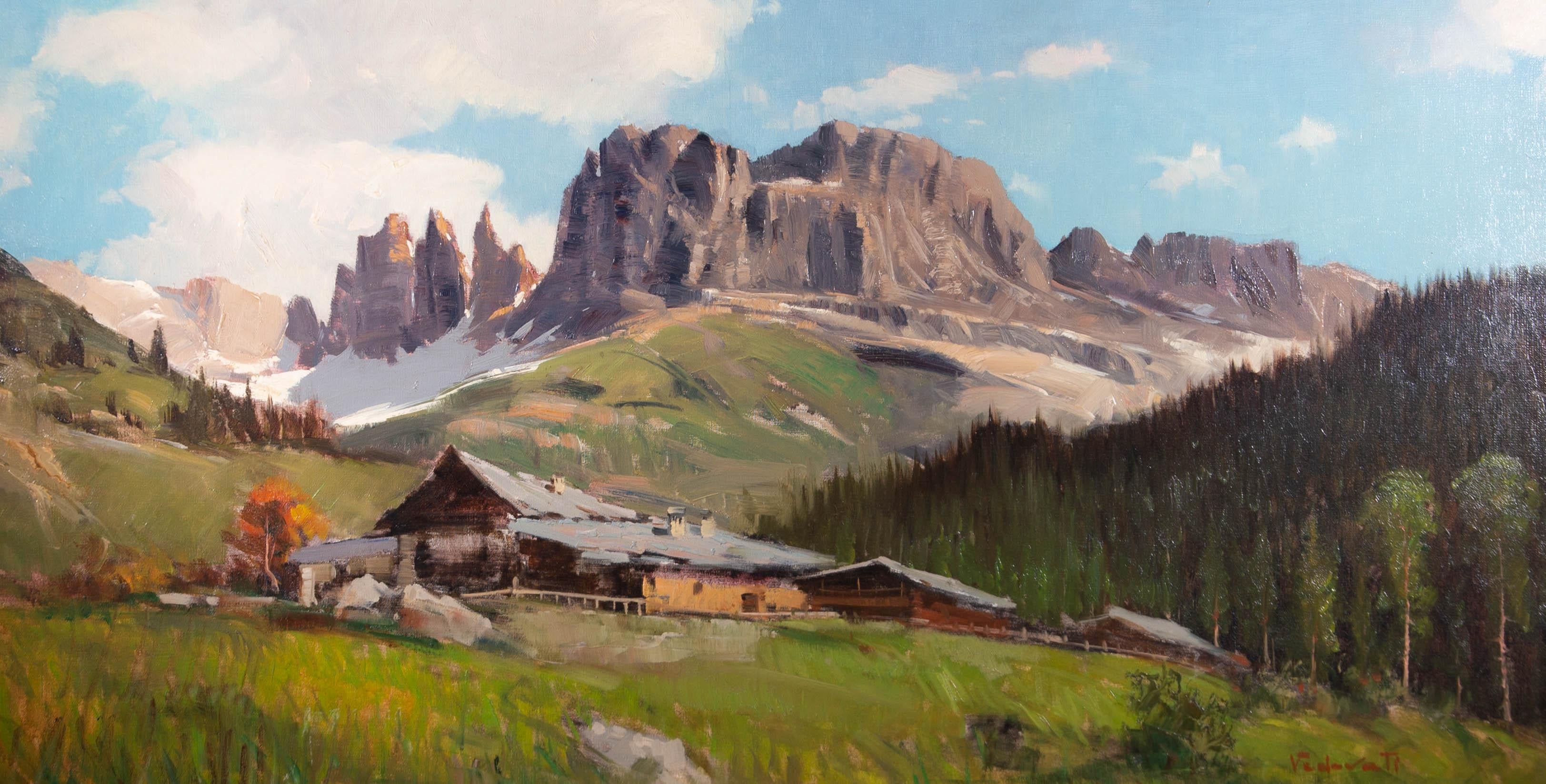 A view of a chalet at the foot of an impressive mountain range. Signed to the lower-right edge. On canvas on stretchers.
