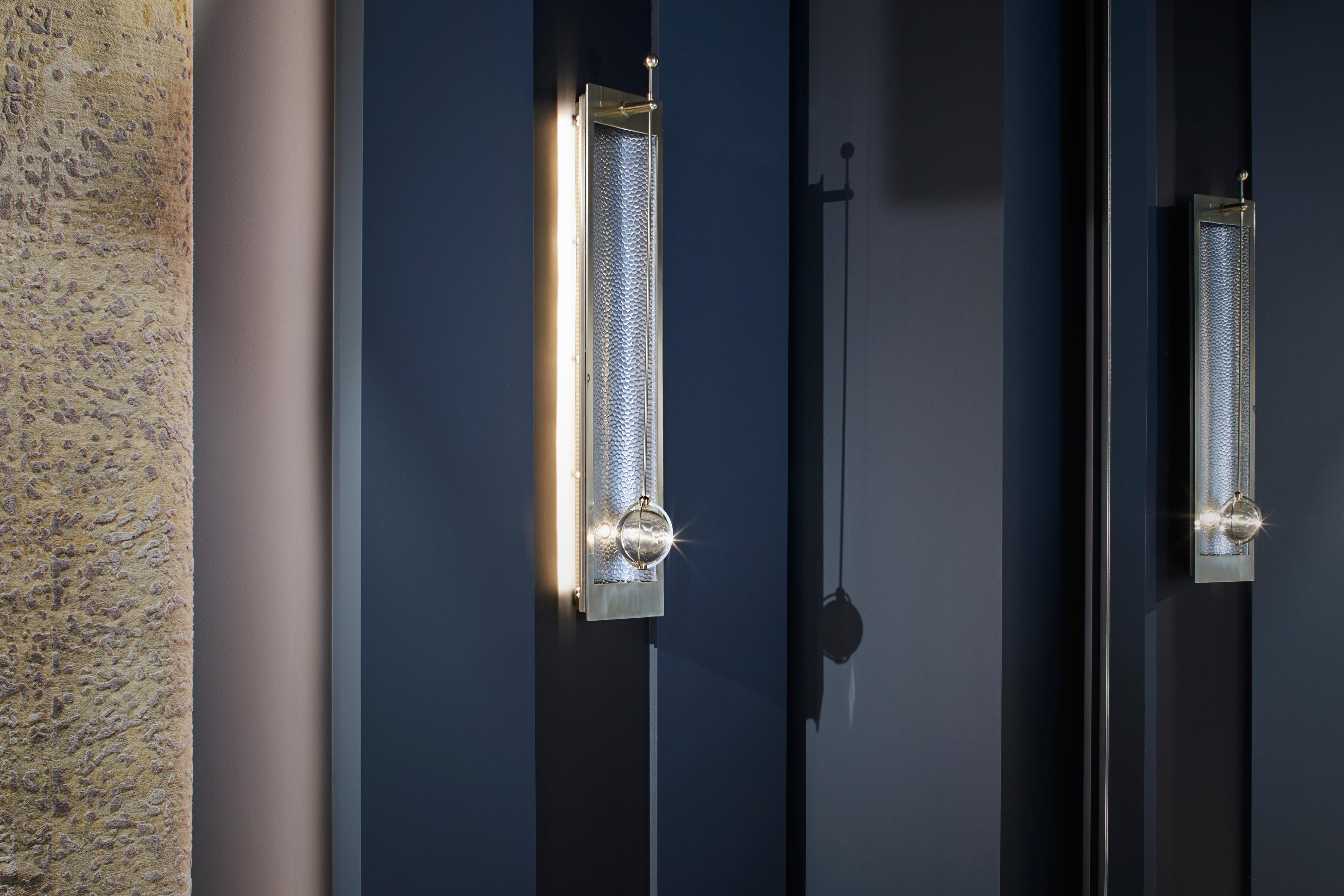 O&A London's Vega wall light is lighting design at its most refined. Crafted to accurately capture the beauty of light, this stunningly beautiful piece adds modern aesthetics and subtle distinction to any indoor space. Its lightweight glass sphere