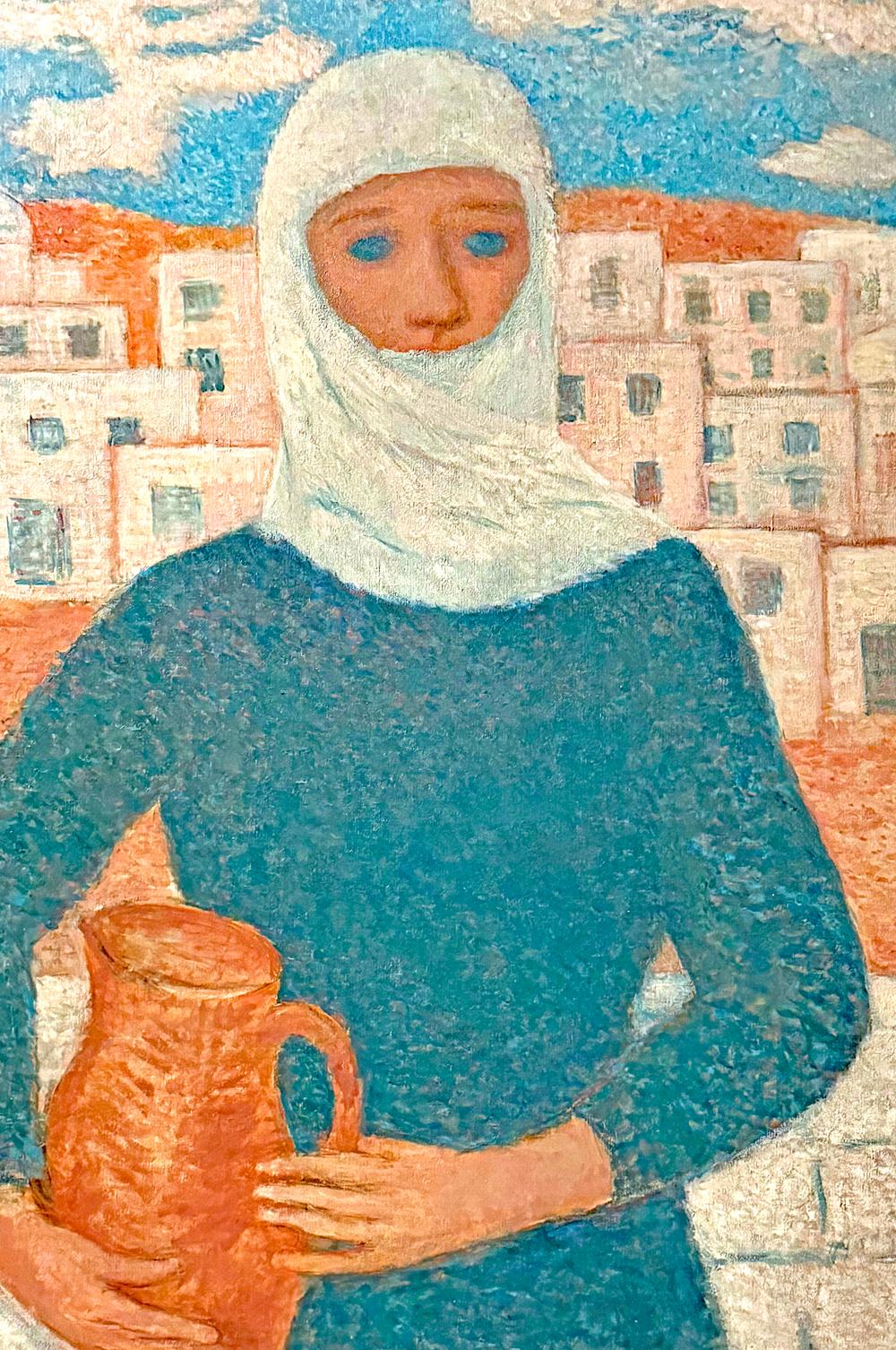 Painted in white and blue in a way that captures the blindingly bright sunlight of North Africa, this painting by Julius Bloch depicts a veiled woman carrying an earthenware jug, framed by a townscape with stuccoed houses and the dome of a mosque. 