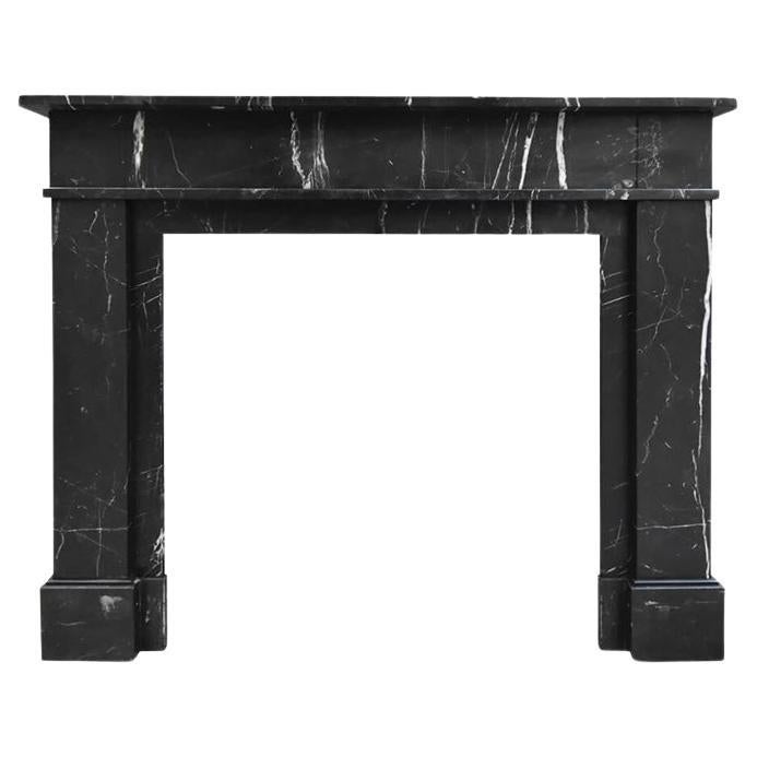 Veined black marble fireplace mantel early 20th Century