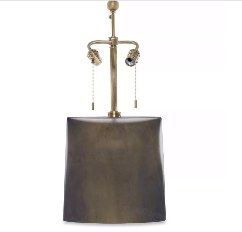 Vintage Murano glass lamp from Donghia with brass hardware, hollow and handblown. The Vela lamp was named for the shape of its base, a sail. The square sail shape is wide, but thin, providing a delicate quality to the design. The clear glass is