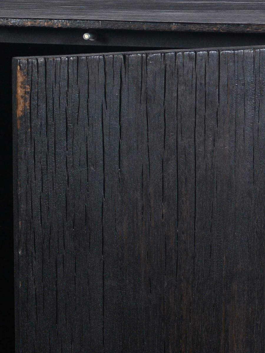 Velcha is produced in a limited edition by the Laurent Passe workshop, it is a three-door sideboard made from old untextured oak wagon boards surmounting a steel frame. The finish is burned in the spirit of Yakisugi*.

“Velsha”

Inspired by the