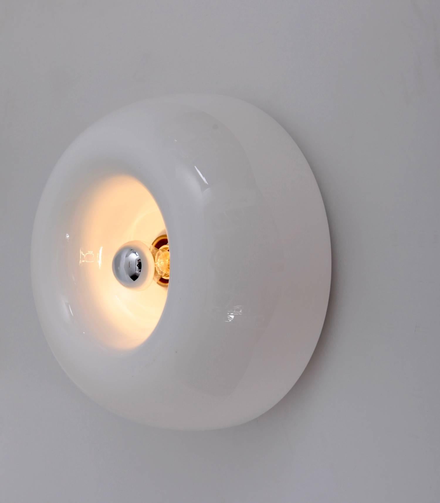 Wall or ceiling opal glass lamp giving diffused light, with or without fluorescent apparatus.

To be on the safe side, the lamp should be checked locally by a specialist concerning local requirements.