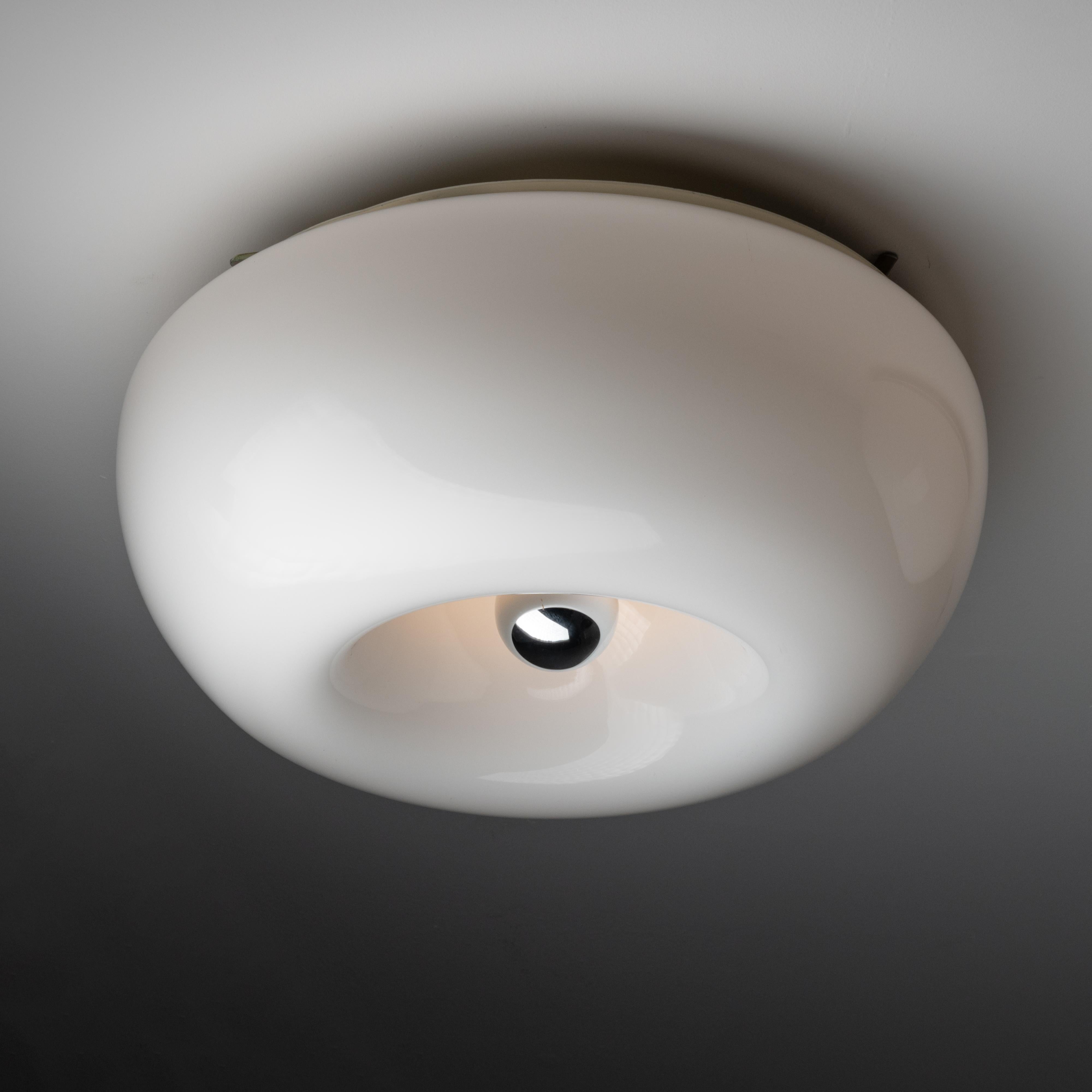 Single 'Velella' Flush Mount by Achille and Pier Giacomo Castiglioni for Flos. Designed and manufactured in Italy, circa 1967. Sculptural mushroom-like flush mount, made of hand blown milk glass. Holds three E27 sockets in the interior section and