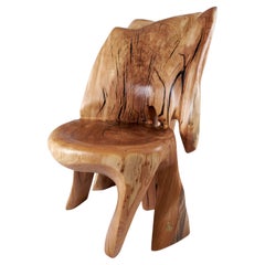 Chaise longue Veles sculptée à partir d'une seule pièce de bois, Logniture