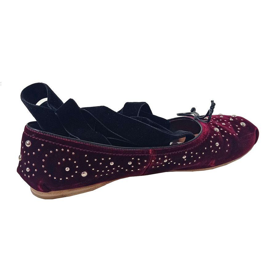 Velvet Burgundy color Embellished with round silver metal studs Can be laced to ankles with a removable black velvet ribbon With dustbag and box
