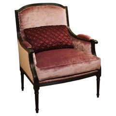 Fauteuil en velours bordeaux 