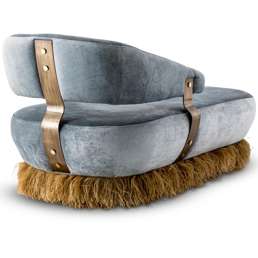 This daybed, chaise lounge is part of the Ostrich Fluff collection designed by Egg Designs and manufactured in South Africa.
The daybed is constructed in two section, these are connected via three bronzed steel brackets which are then fixed with