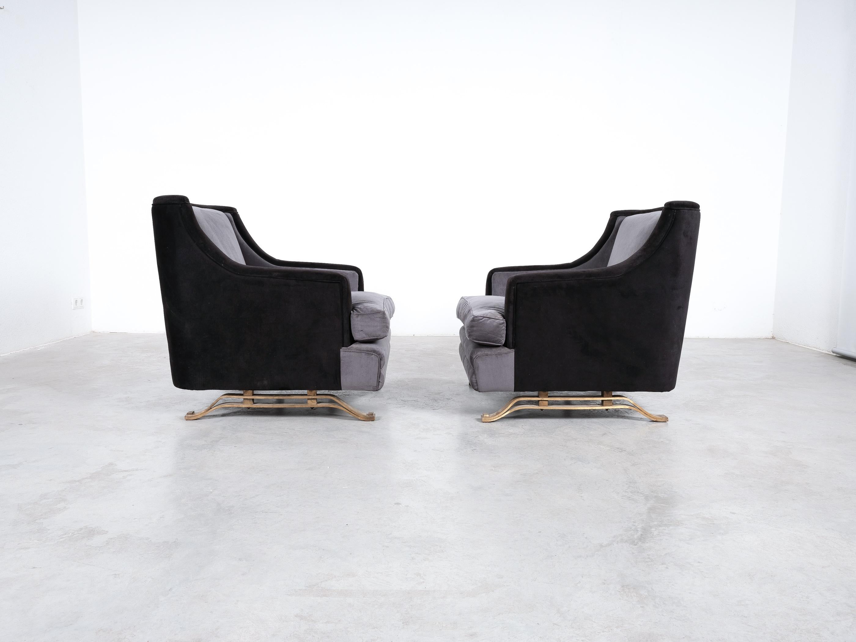 Nice pair of Italian armchairs, newly upholstered in velvet, circa 1955

Stylish club chairs, very comfortable and upholstered in dark grey and black velvet. They are in good original condition with no major flaws and ready to use. Main focus of