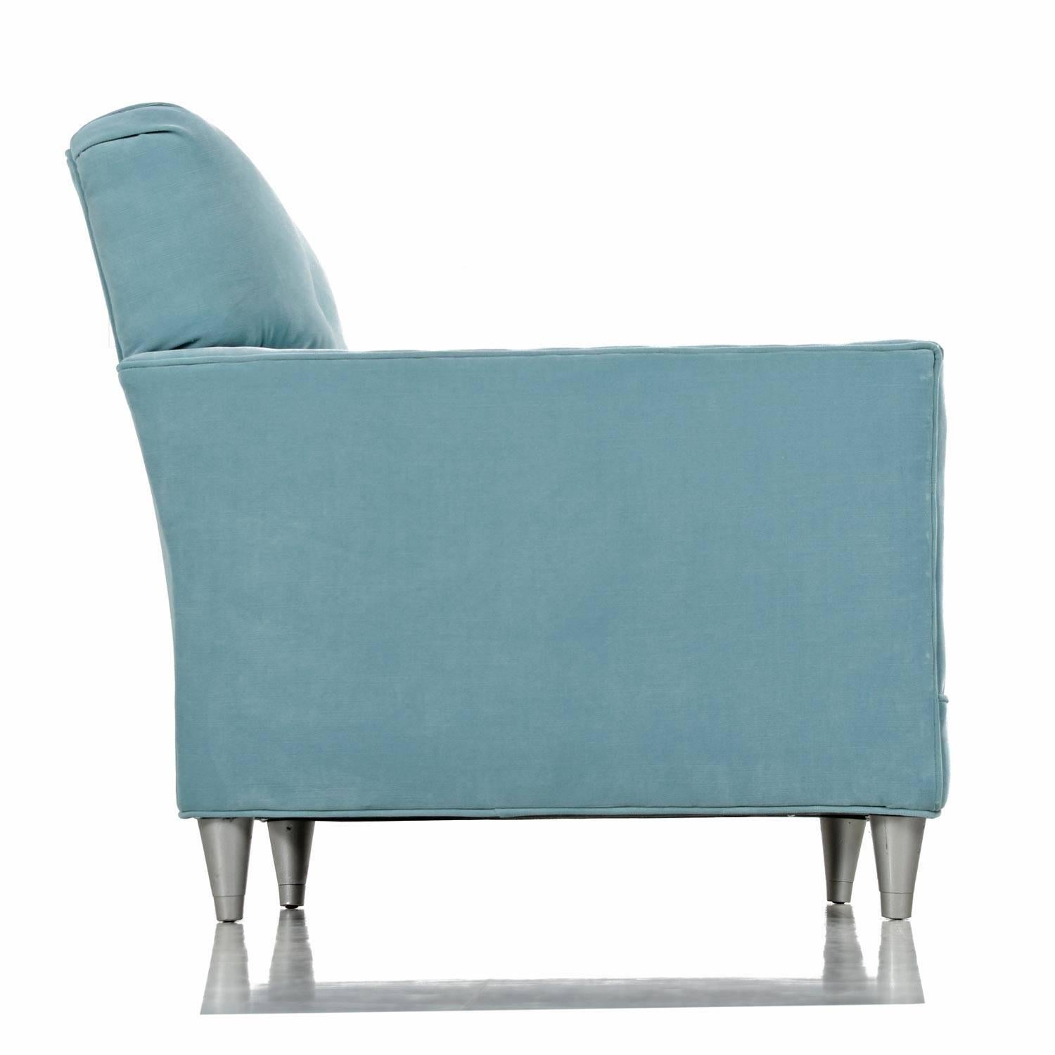 Sleek, straight lines give this chair an unmistakably Mid-Century Modern profile. Today's designers have mimicked this look in countless contemporary creations, but failed to improve on the perfection of this original. 

New teal velvet fabric top