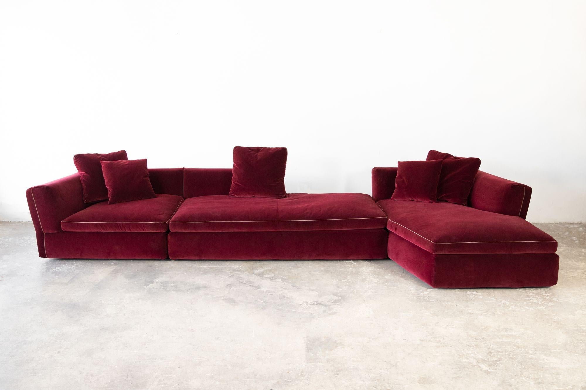 Three-piece velvet Cassina Sectional sofa designed by Rudolfo Dordoni. Upholstered in a high-grade deep wine-colored velvet. Purchased new but never installed. Can be reconfigured to your liking. Extraordinarily well made. Sexy and comfortable.