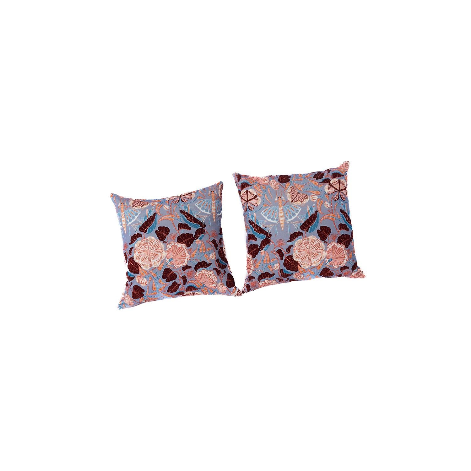 Down filled velvet pillows in a Grasshopper print by Klaus Haapaniemi, designed and produced by Danish Teak Classics. This textile design is a lovely modern - surrealist print that features morning glories, peonies and fantastical flora interspersed