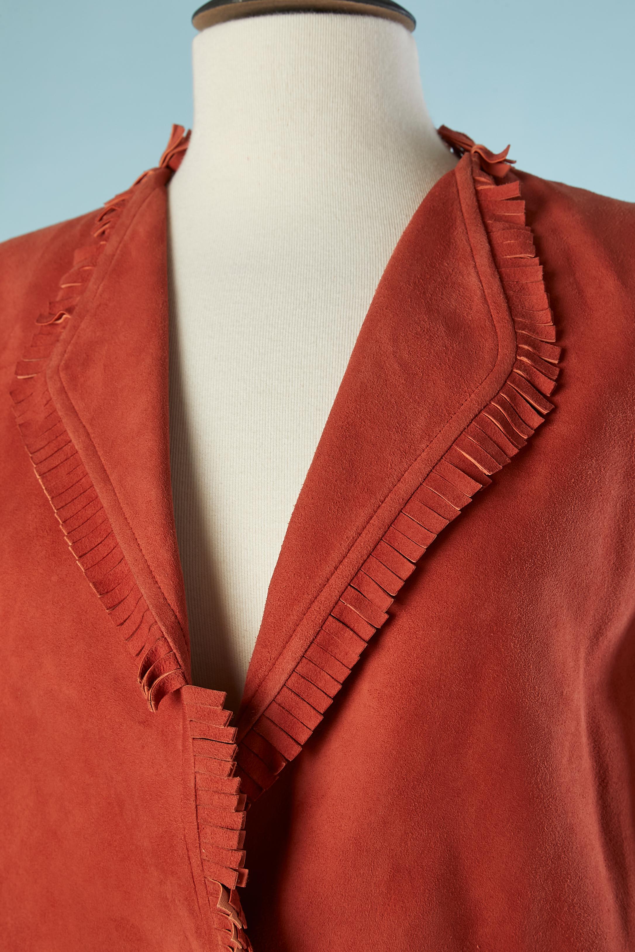 Terracotta velvet lamb suede jacket with fringes edge. Acetate lining. Shoulder pads.
SIZE 36 ( M) 