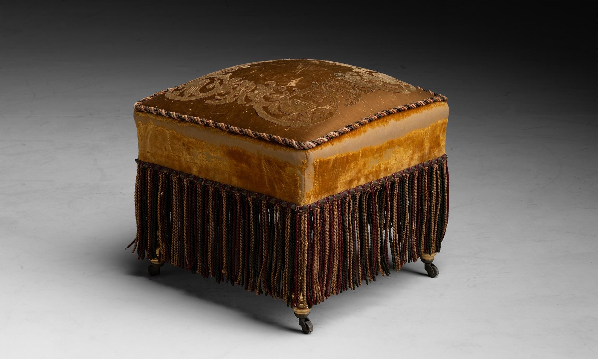 Velvet Ottoman
England circa 1890
Original upholstery, on Gilt barley twist legs with original castors.
20”w x 20”d x 18”h