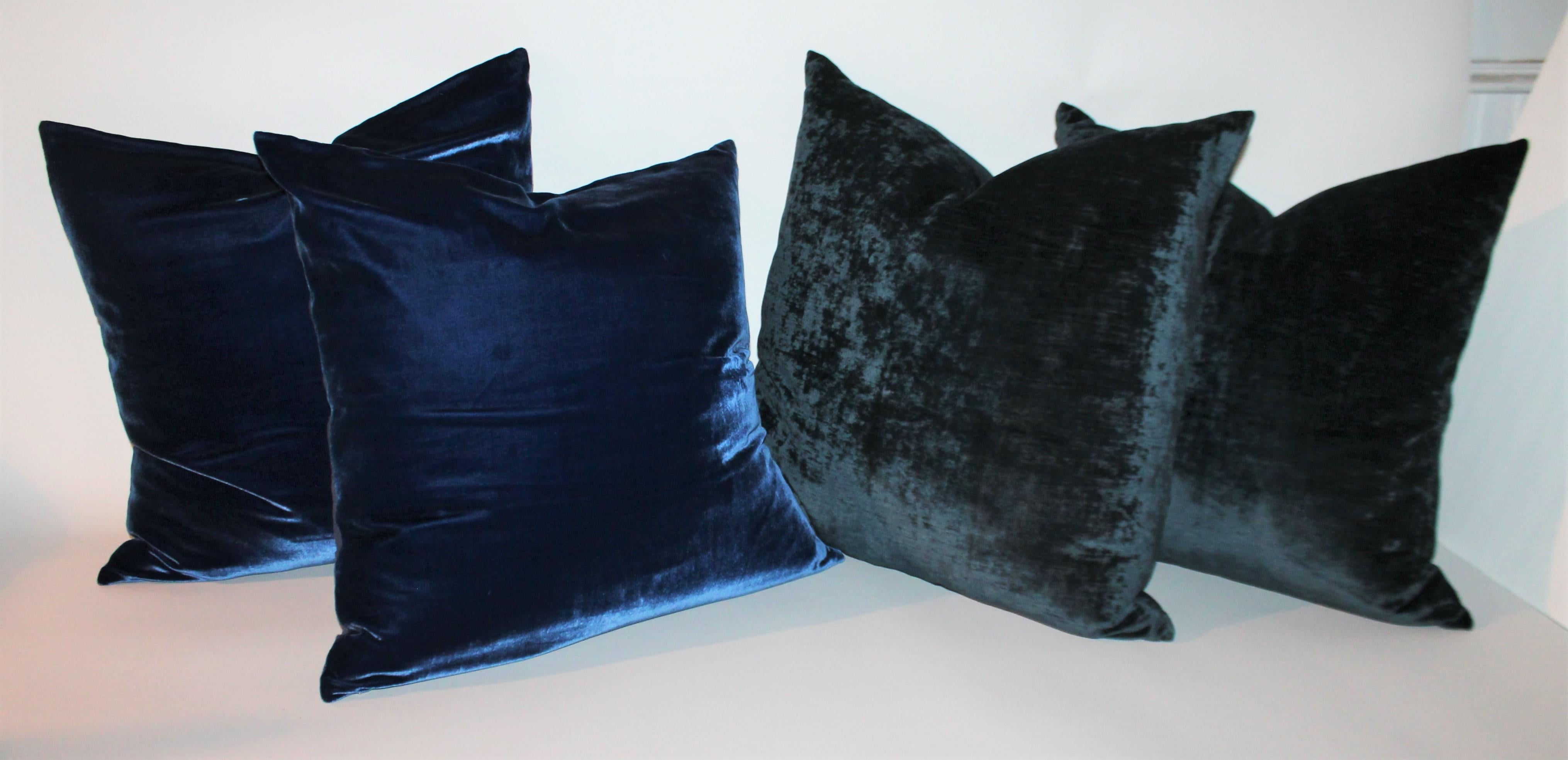 Sets sold together or individually pairs. The lighter royal blue pair or darker indigo blue velvet pairs are in fine condition.

Vintage velvet front and linen backing with down and feather inserts. Only one pair of each in stock.