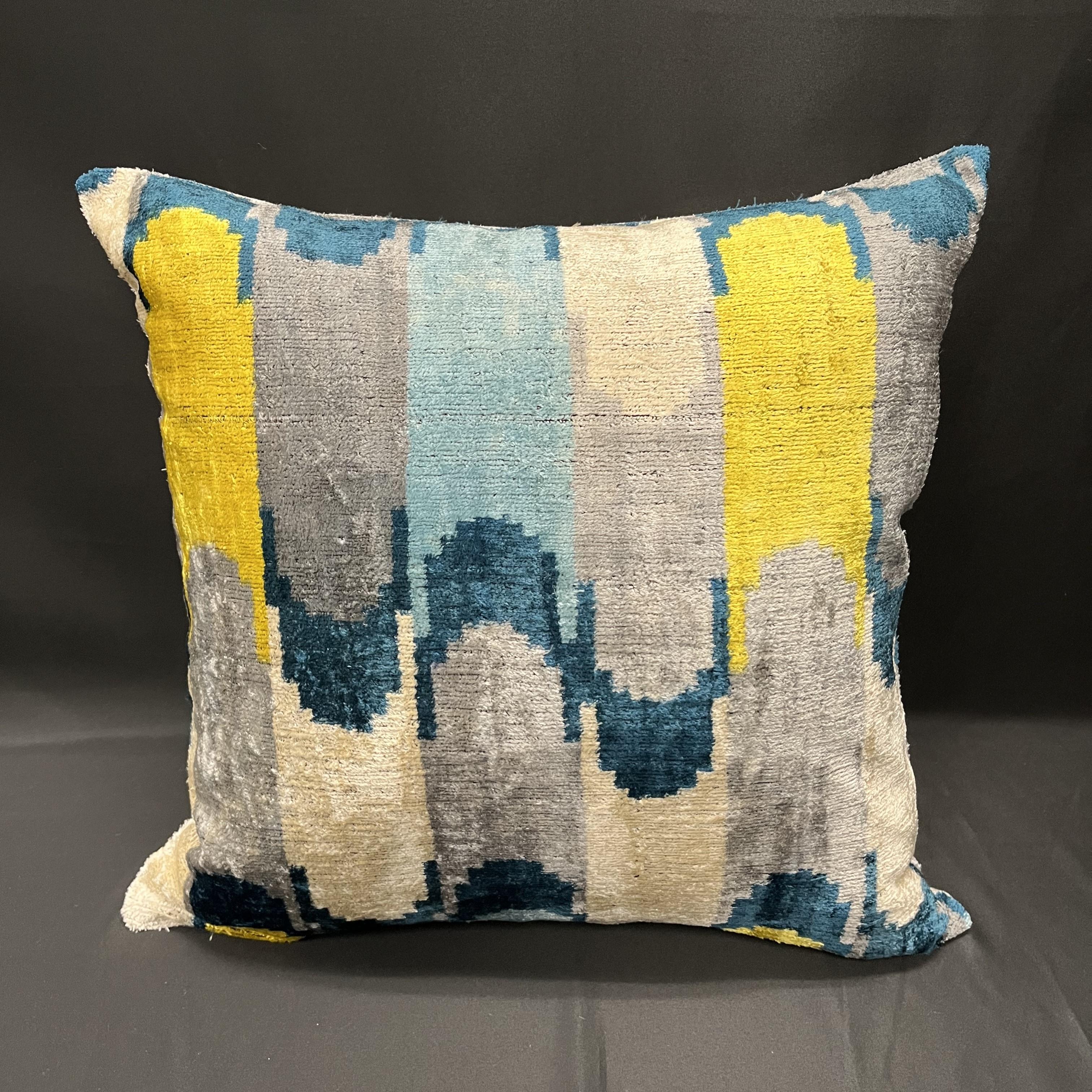 Introducing a stunning Turkish velvet ikat pillowcase, expertly handwoven from the finest silk and adorned with vibrant hand-dyed patterns. This exquisite pillowcase is a true work of art, crafted by skilled artisans using traditional techniques