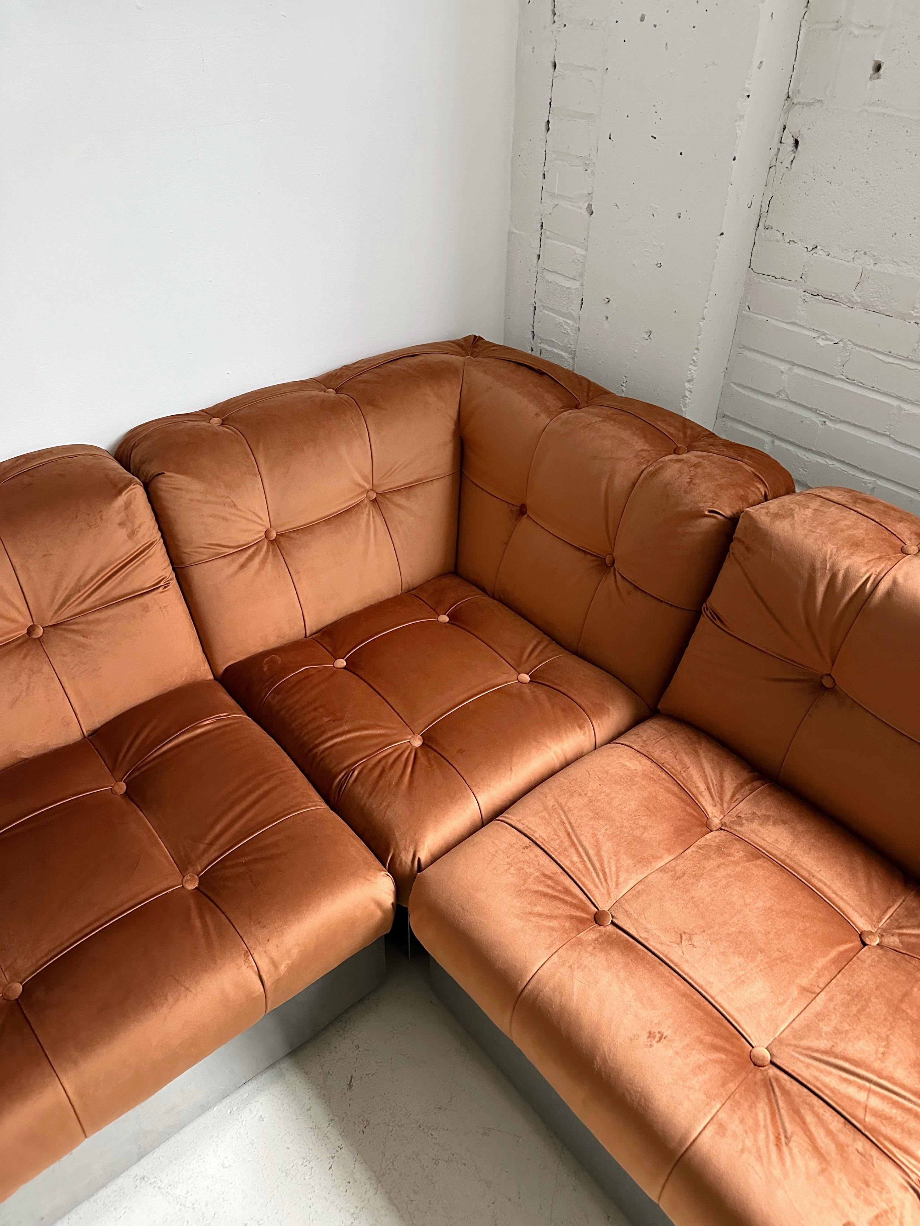 Vintage Terracotta Velvet & Steel Base 4 Piece Modular Sofa attributed to Canasta by Giorgio Montani for Souplina, 70's

Consists of 2 corner and 2 middle pieces

//

Dimensions:
Each corner piece: 32.5”W x 32.5”D x 27”H seat height 15