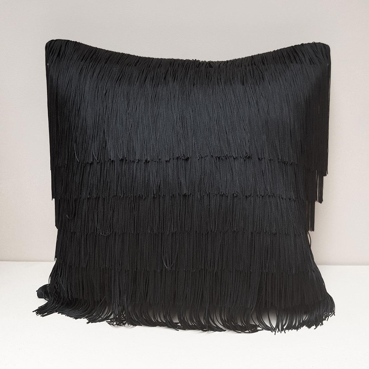 In a sumptuous black, our signature velvet tassel cushion will make the ultimate decorative statement in your home. Whether you’re a maximalist adding to your many layers of décor or a minimalist wanting to make an impact this cushion does the