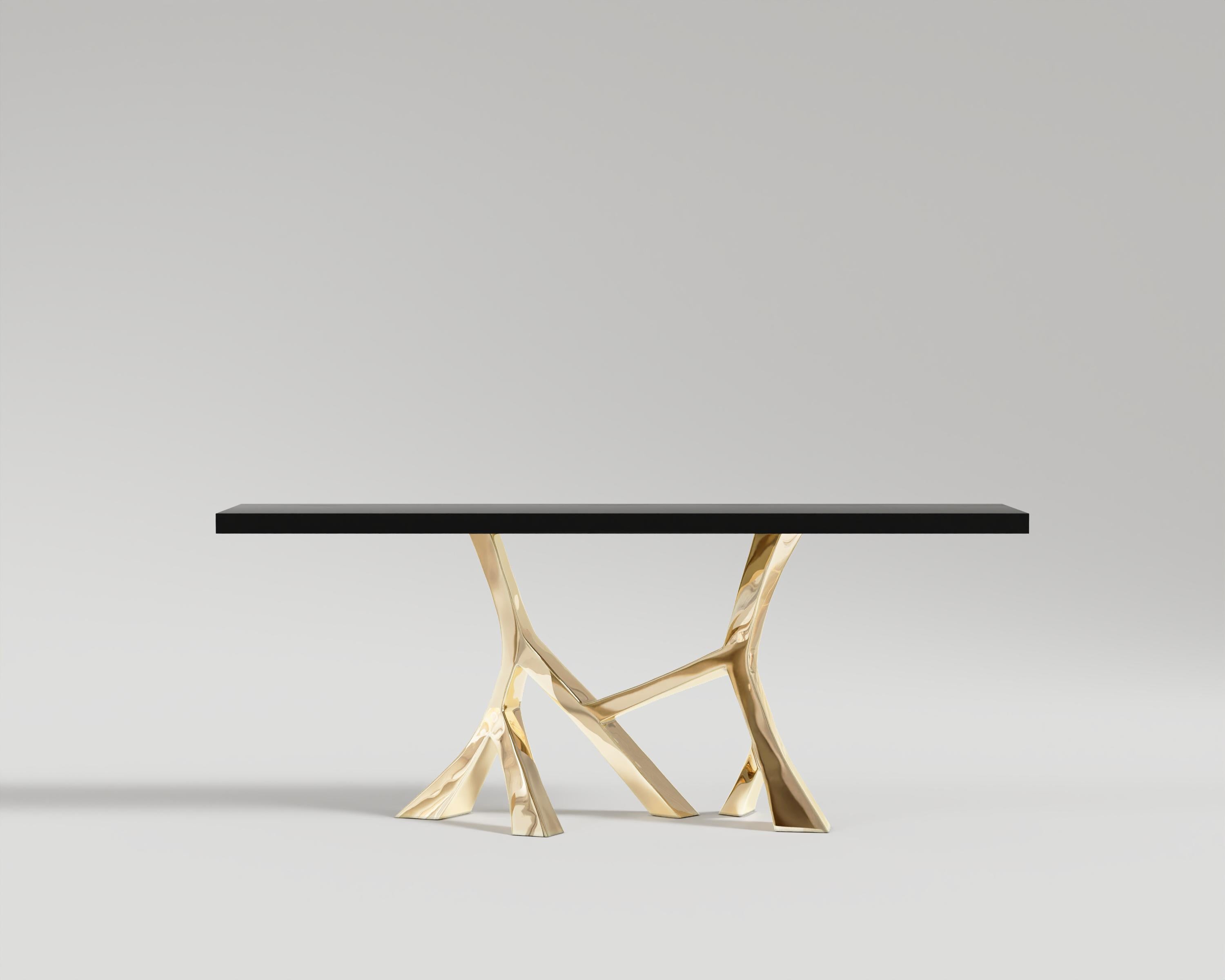 Vena Console Table 
Introducing the “Vena” – a transcendent masterpiece that embodies the pinnacle of luxury and craftsmanship in the world of bespoke furniture. This exquisite dining table is not just an ensemble; it’s an artful synthesis of
