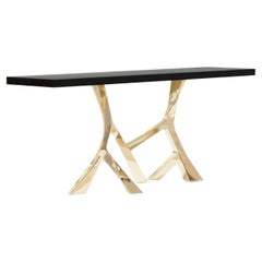 Table console Vena en bronze poli et plateau laqué noir 