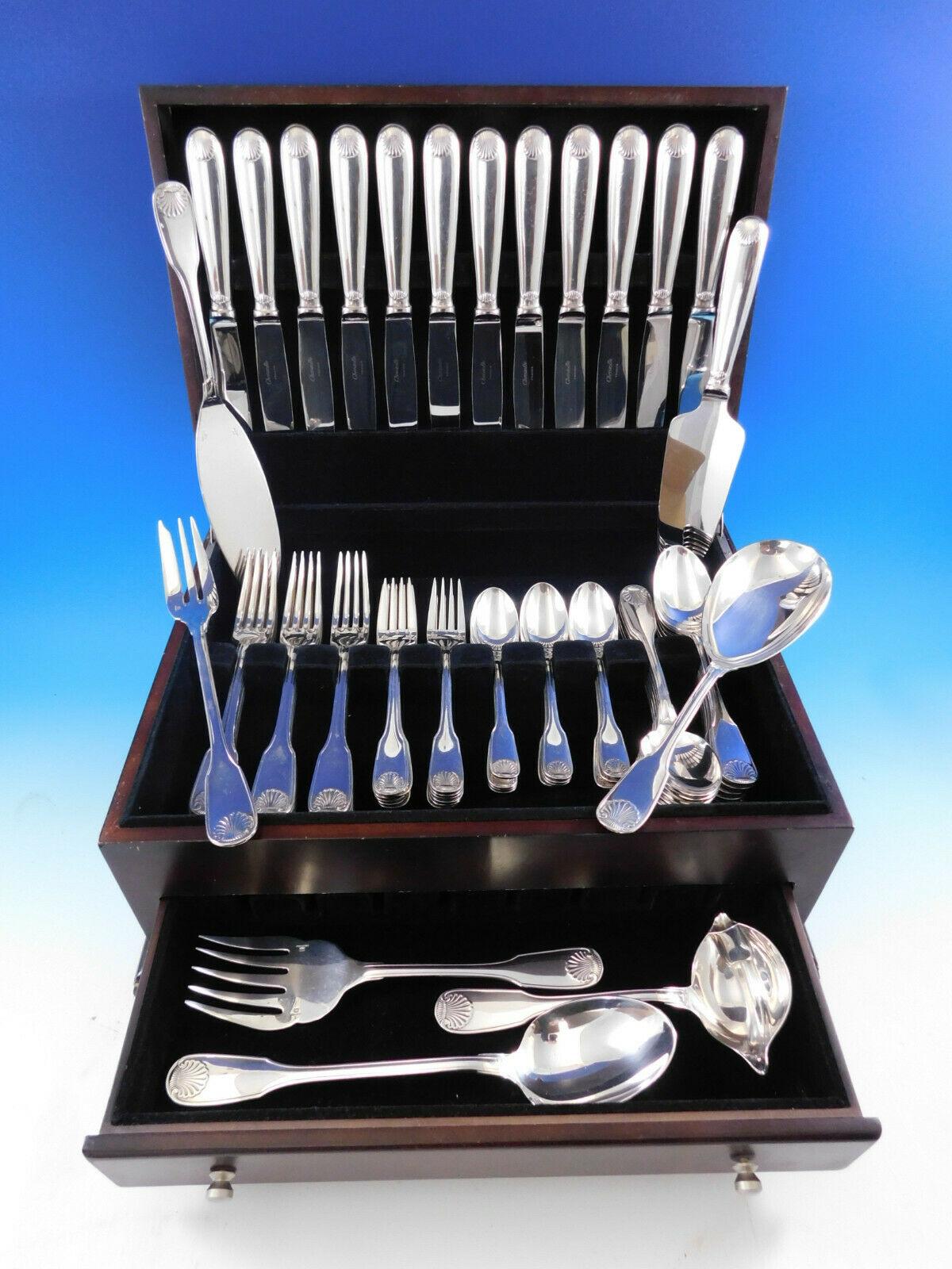 Outstanding dinner size Vendome Arcantia by Christofle France silver plated flatware set, 67 pieces. This pattern features the same shell motif that adorned the ceremonial silverware used during the reign of King Louis XIV. This set includes:

12