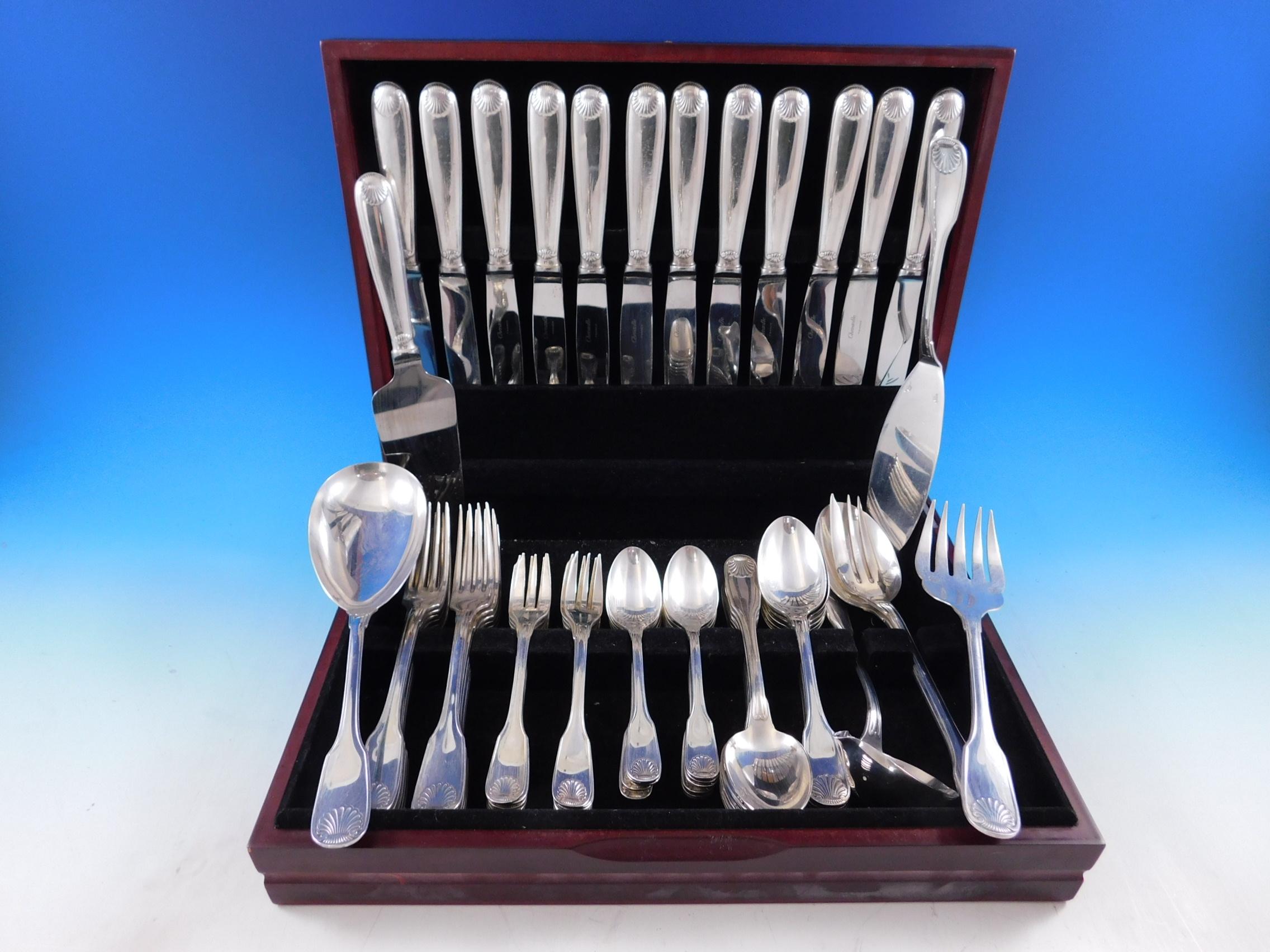 Outstanding dinner size Vendome Arcantia by Christofle France silver plated flatware set, 67 pieces. This pattern features the same shell motif that adorned the ceremonial silverware used during the reign of King Louis XIV. This set includes:

12