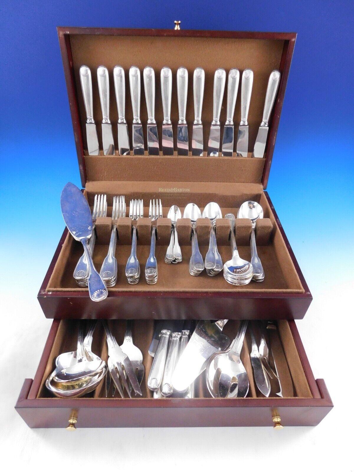 Vendome Arcantia by Christofle France Silverplated flatware set, 96 pieces. This pattern features the same shell motif that adorned the ceremonial silverware used during the reign of King Louis XIV. This set includes:

12 Luncheon Knives, 8 1/4