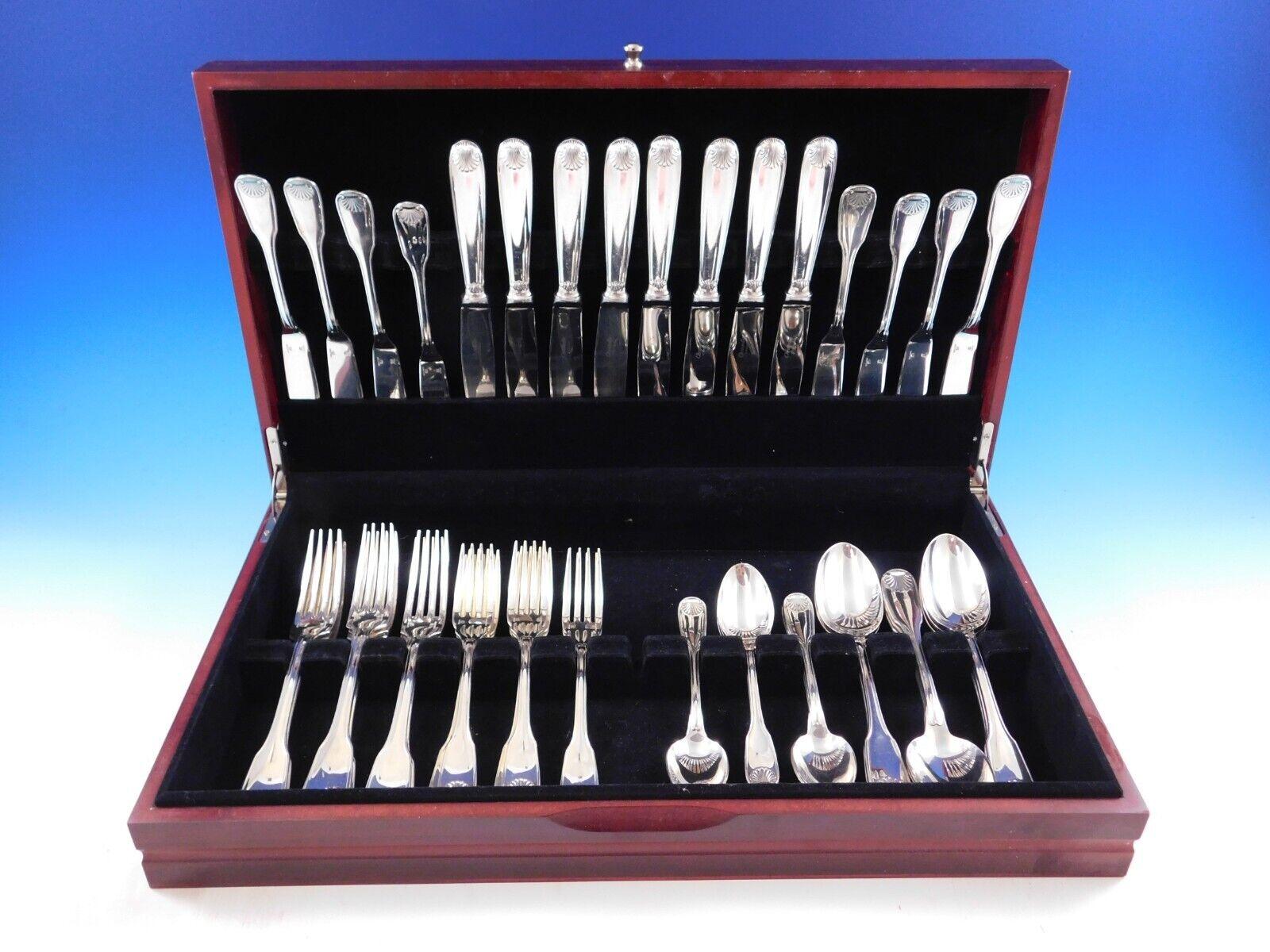 Vendome Arcantia by Christofle France silverplated flatware set, 56 pieces. This pattern featured the same shell motif that adorned the ceremonial silverware used during the reign of King Louis XIV. This set includes:

8 Knives, 9