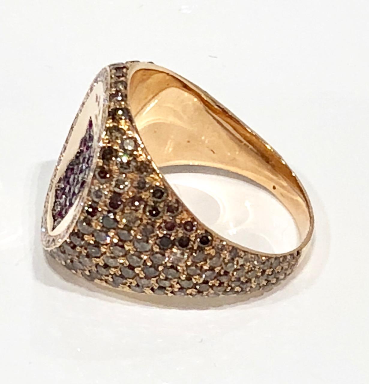 Unisex Signet ring in 18k rose gold, ruby and white diamond crown ring with cognac pave diamond shank.
Designed by Martyn Lawrence Bullard
Can be made in any size, lead time 4 weeks