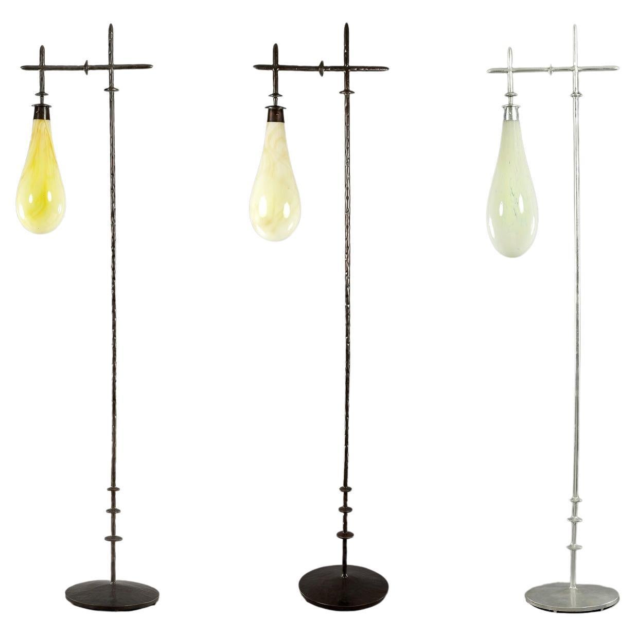 Unique floor lamp with over size hand blown glass shade