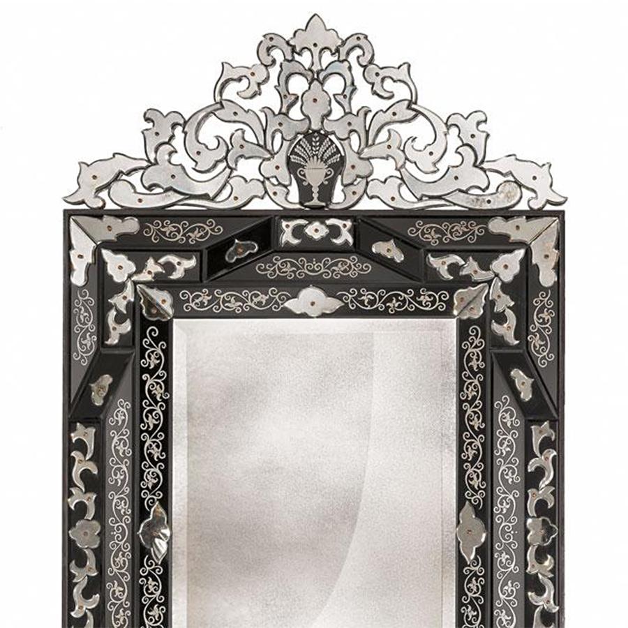 Mirror Glass Vendome with back structure in solid wood 
and with carved glass frame decorations in bevelled glass, 
in medium antique mirrored finish and engraved black glass.
With rectangular center mirror glass in antique finish.