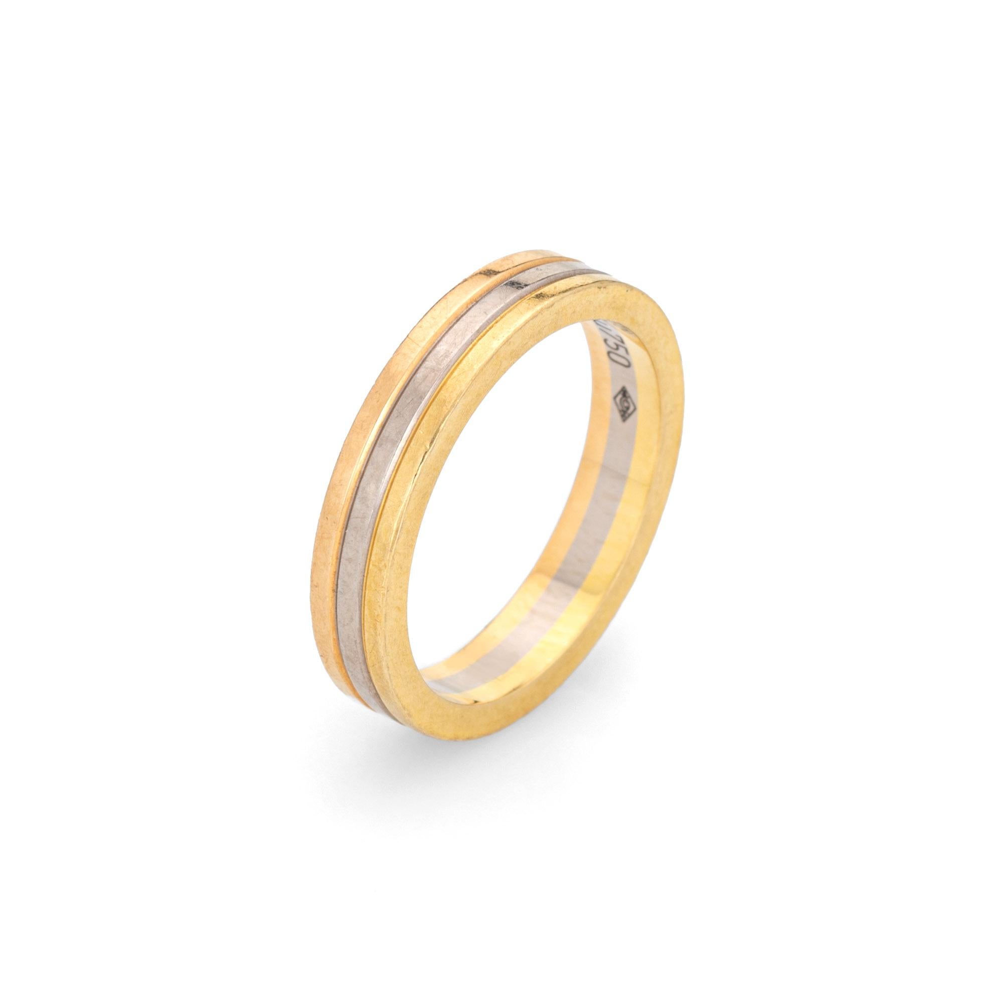 Pre-owned Vendome Louis Cartier wedding band crafted in 18k yellow, white & rose gold.  

The Cartier ring features bands of 18k rose, yellow & white gold. The 3.5mm wide ring is great worn alone or layered with your fine jewelry from any era. 

The