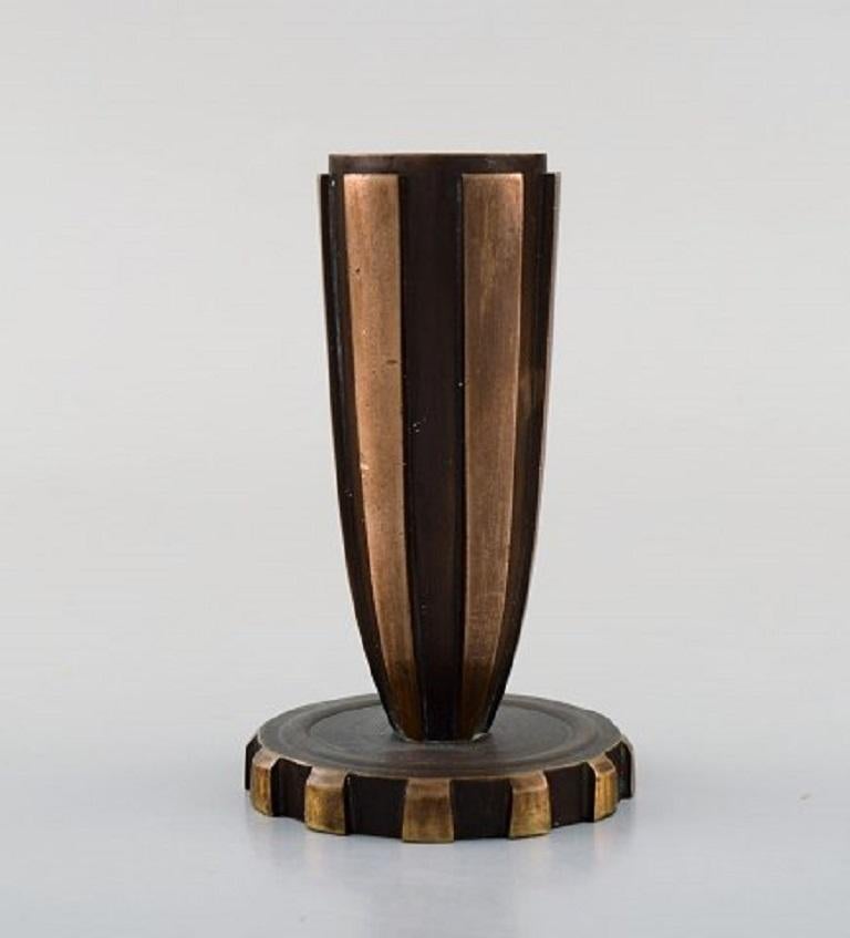 Vendor, Denmark. Art Deco candleholder in patinated bronze, 1940s-1950s.
Measures: 9.5 x 6 cm.
In very good condition.