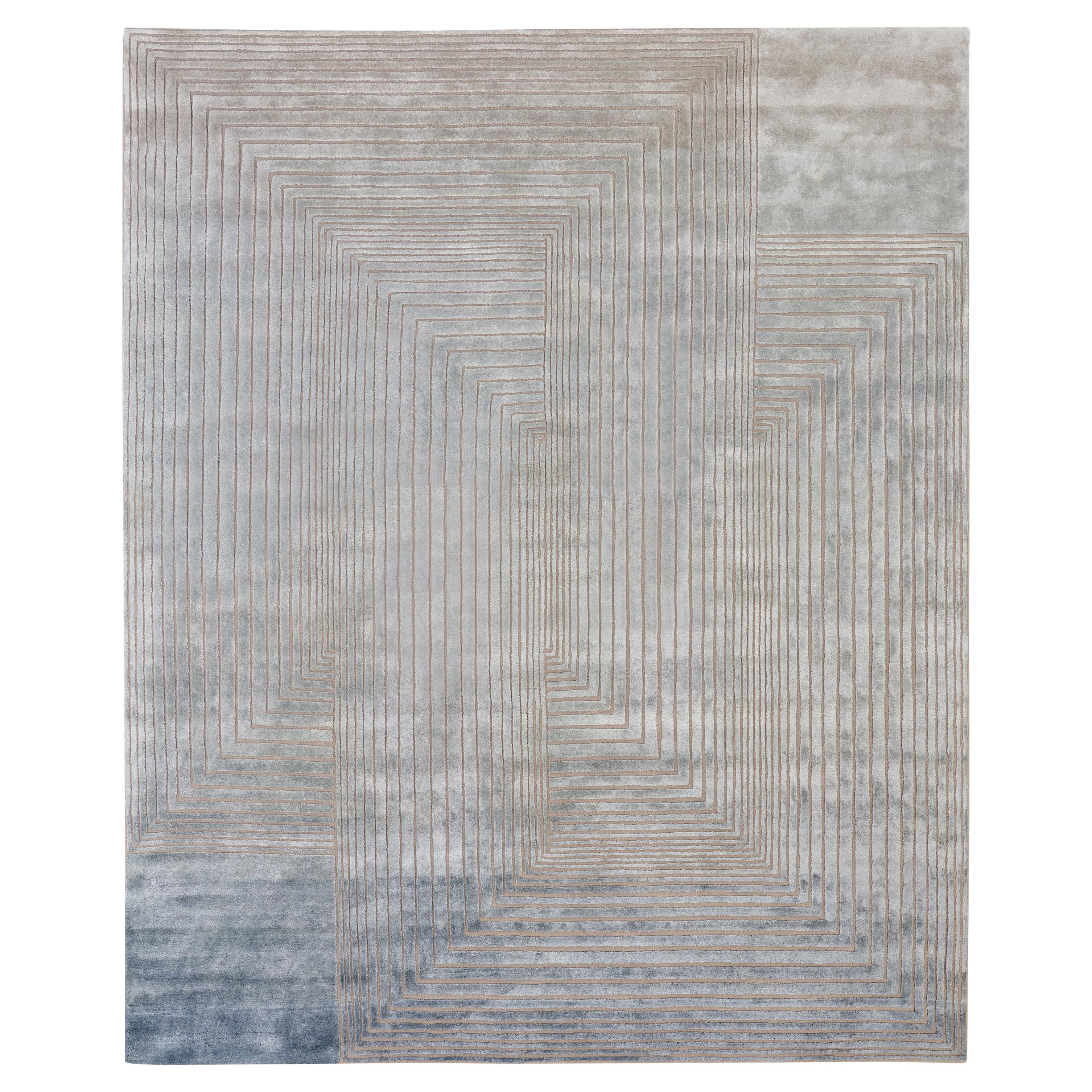 VENEER - Tapis contemporain touffeté à la main en laine et soie, couleurs bleu et rouille par mains