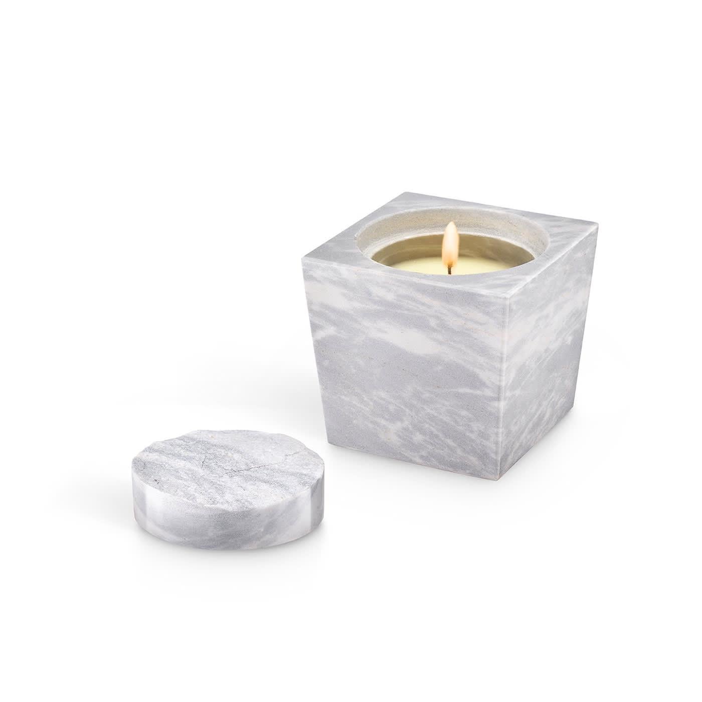 Elegant, timeless marble candle, the wayward Roman goddess of beauty and eros. Palissandro Reale or marble metamorphic rock, with marked and heterogeneous veins of white, delicate blue. The uniqueness of the minerals creates shining, surprising,