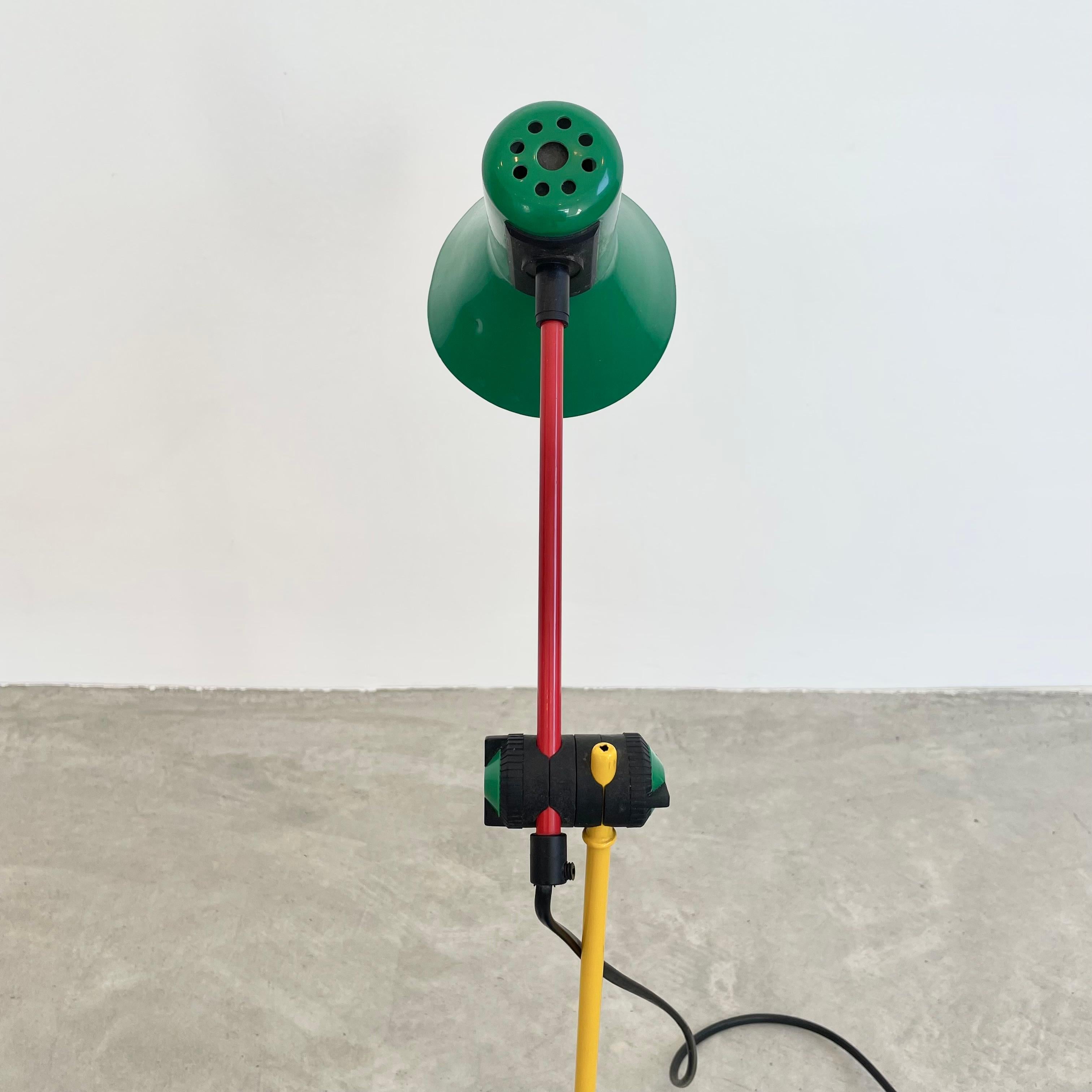 Highly collectible post-modern Z1-90 desk lamp produced by Veneta Lumi in the early 1990’s. Using a combination of colours that are evocative of the Memphis group, the lamp is composed of two separate powder-coated steel metal rods, one holding the