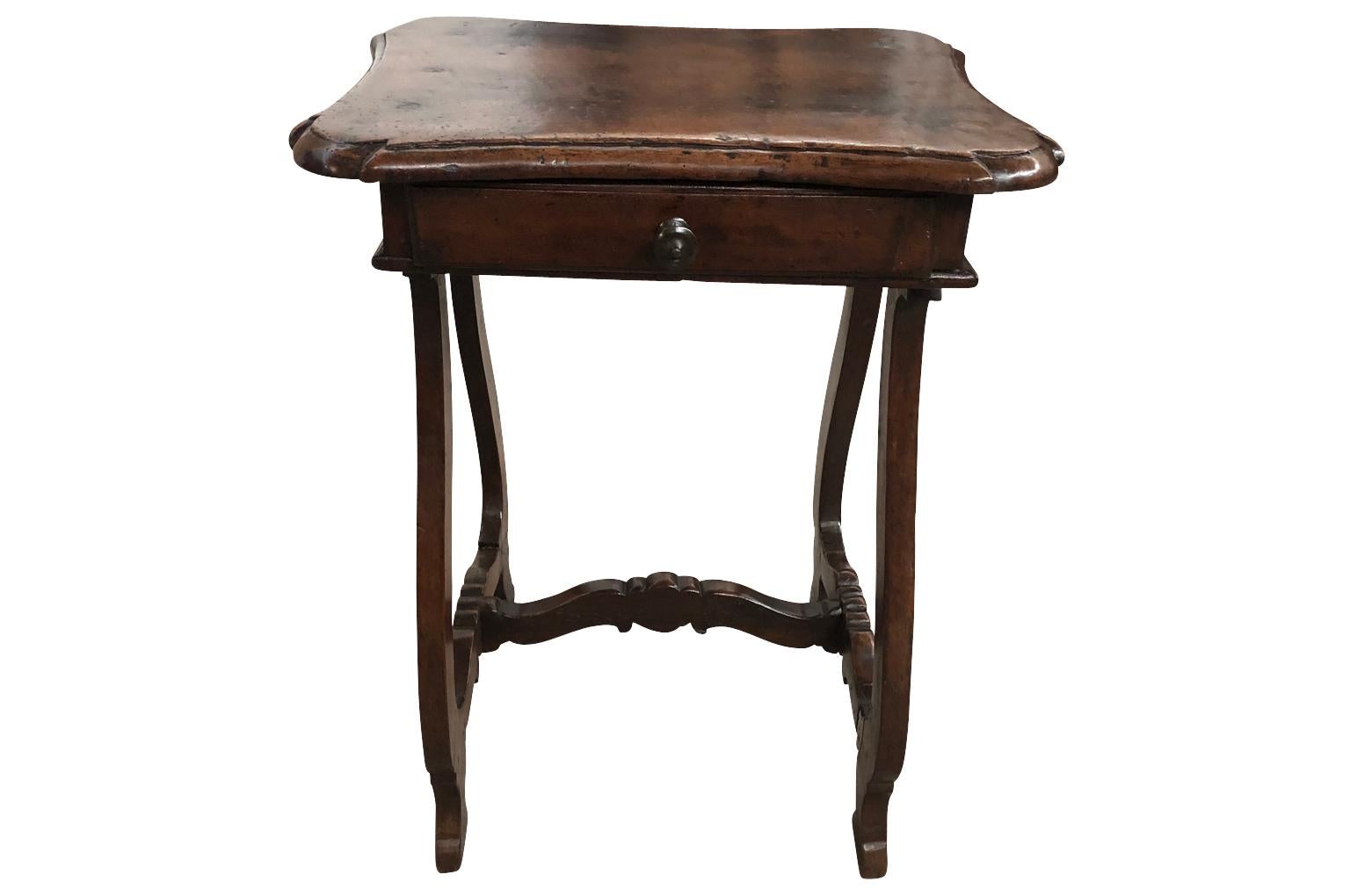 An exquisite 18th century Venetian side Table soundly constructed from stunning walnut. The table has a beautiful edge finish to the top, a single drawer and lovely lyre shaped legs. Outstanding patina - warm and luminous.